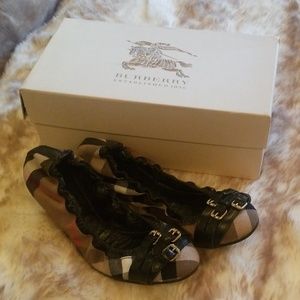 Black and tan Burberry flats
